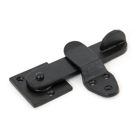 This is an image showing From The Anvil - Black Privacy Latch Set available from trade door handles, quick delivery and discounted prices