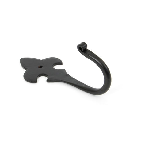 This is an image showing From The Anvil - Black Fleur-De-Lys Coat Hook available from trade door handles, quick delivery and discounted prices