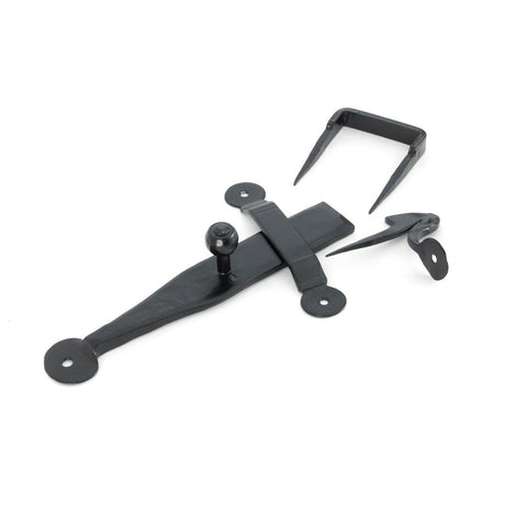 This is an image showing From The Anvil - Black Latch Set available from trade door handles, quick delivery and discounted prices