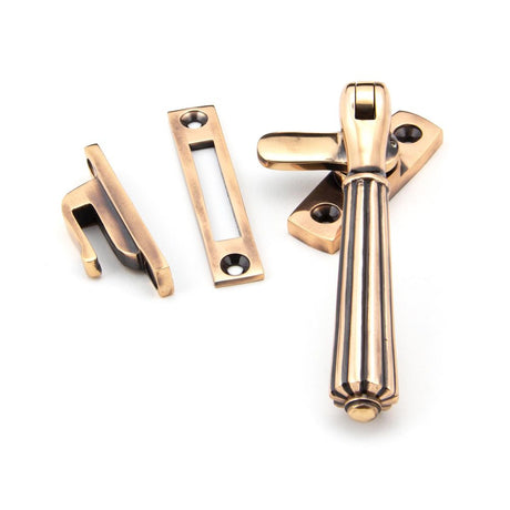 This is an image showing From The Anvil - Polished Bronze Locking Hinton Fastener available from trade door handles, quick delivery and discounted prices