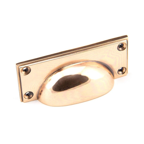 This is an image showing From The Anvil - Polished Bronze Art Deco Drawer Pull available from trade door handles, quick delivery and discounted prices