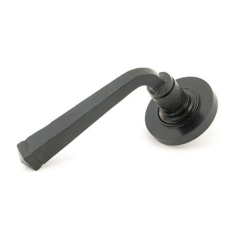 This is an image showing From The Anvil - External Beeswax Avon Round Lever on Rose Set (Plain) available from trade door handles, quick delivery and discounted prices