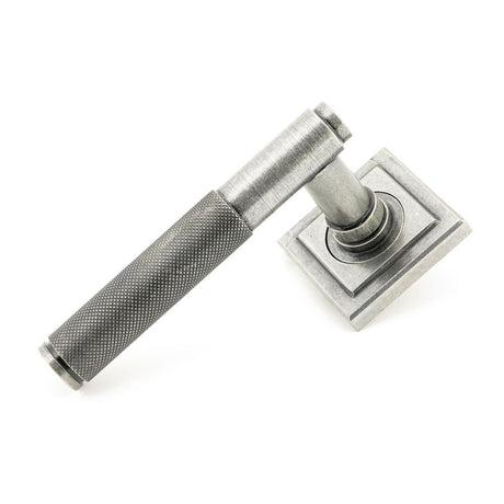 This is an image showing From The Anvil - Pewter Brompton Lever on Rose Set (Square) available from trade door handles, quick delivery and discounted prices