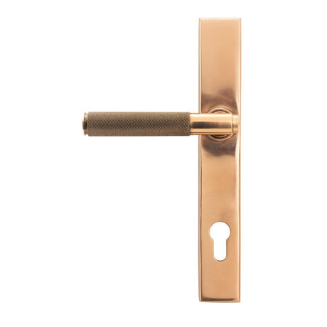 This is an image showing From The Anvil - Polished Bronze Brompton Slimline Espag. Lock Set available from trade door handles, quick delivery and discounted prices