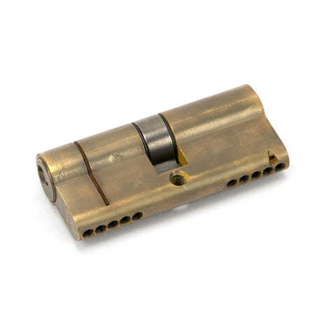 This is an image showing From The Anvil - Aged Brass 35/35 5pin Euro Cylinder available from trade door handles, quick delivery and discounted prices