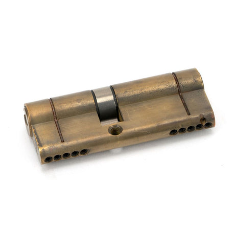 This is an image showing From The Anvil - Aged Brass 35/45 5pin Euro Cylinder available from trade door handles, quick delivery and discounted prices