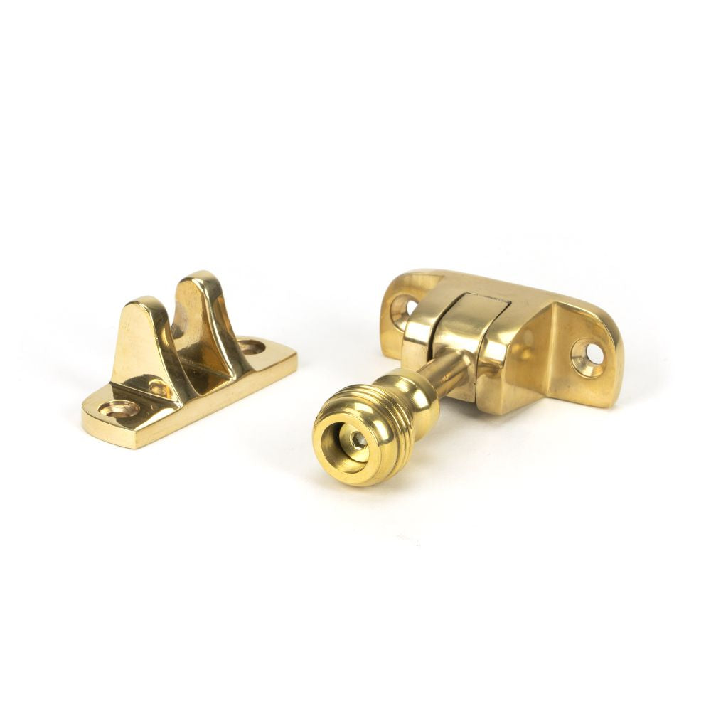 This is an image showing From The Anvil - Polished Brass Prestbury Brighton Fastener (Radiused) available from trade door handles, quick delivery and discounted prices
