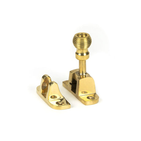 This is an image showing From The Anvil - Polished Brass Beehive Brighton Fastener (Radiused) available from trade door handles, quick delivery and discounted prices