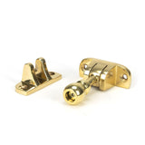 This is an image showing From The Anvil - Polished Brass Mushroom Brighton Fastener (Radiused) available from trade door handles, quick delivery and discounted prices