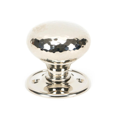 This is an image showing From The Anvil - Polished Nickel Hammered Mushroom Mortice/Rim Knob Set available from trade door handles, quick delivery and discounted prices