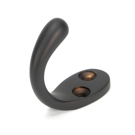 This is an image showing From The Anvil - Aged Bronze Celtic Single Robe Hook available from trade door handles, quick delivery and discounted prices
