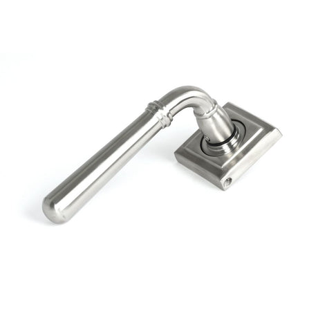 This is an image showing From The Anvil - Satin Marine SS (316) Newbury Lever on Rose Set (Square) available from trade door handles, quick delivery and discounted prices