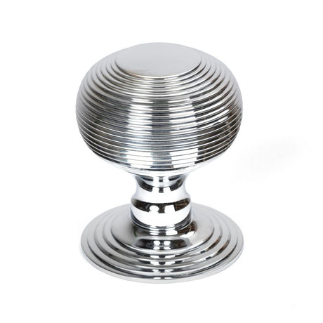 This is an image showing From The Anvil - Polished Chrome Beehive Centre Door Knob available from trade door handles, quick delivery and discounted prices