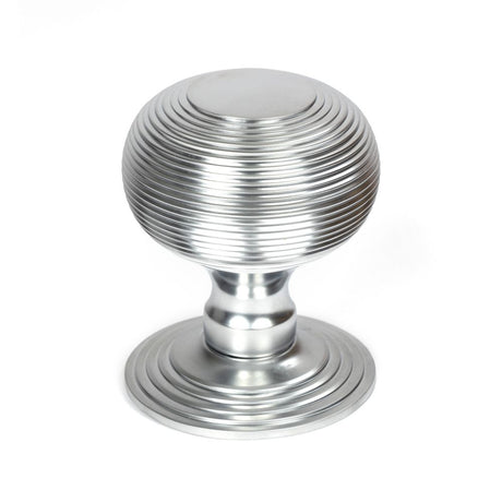 This is an image showing From The Anvil - Satin Chrome Beehive Centre Door Knob available from trade door handles, quick delivery and discounted prices