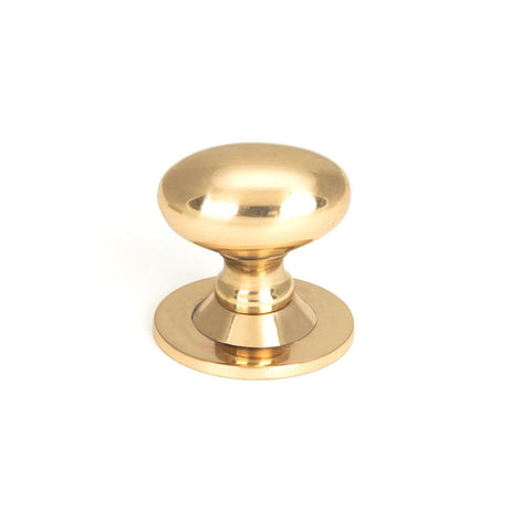 This is an image showing From The Anvil - Polished Bronze Oval Cabinet Knob 40mm available from trade door handles, quick delivery and discounted prices