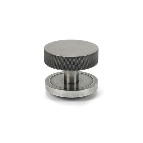 This is an image showing From The Anvil - Pewter Brompton Centre Door Knob (Plain) available from trade door handles, quick delivery and discounted prices