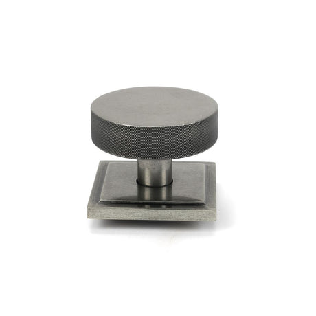 This is an image showing From The Anvil - Pewter Brompton Centre Door Knob (Square) available from trade door handles, quick delivery and discounted prices