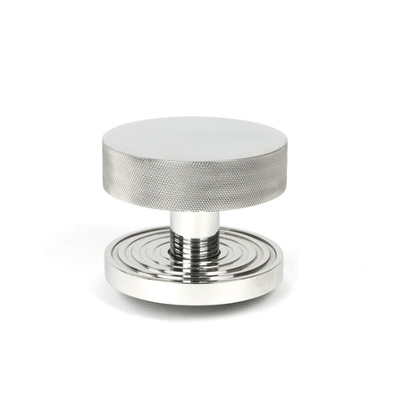 This is an image showing From The Anvil - Polished Marine SS (316) Brompton Centre Door Knob (Beehive) available from trade door handles, quick delivery and discounted prices