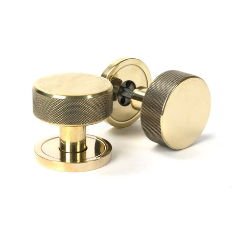 This is an image showing From The Anvil - Aged Brass Brompton Mortice/Rim Knob Set (Plain) available from trade door handles, quick delivery and discounted prices