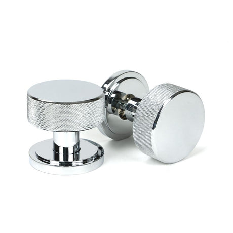 This is an image showing From The Anvil - Polished Chrome Brompton Mortice/Rim Knob Set (Art Deco) available from trade door handles, quick delivery and discounted prices