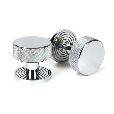 This is an image showing From The Anvil - Polished Chrome Brompton Mortice/Rim Knob Set (Beehive) available from trade door handles, quick delivery and discounted prices