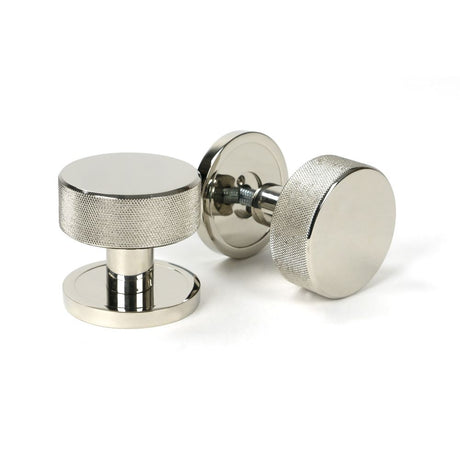 This is an image showing From The Anvil - Polished Nickel Brompton Mortice/Rim Knob Set (Plain) available from trade door handles, quick delivery and discounted prices