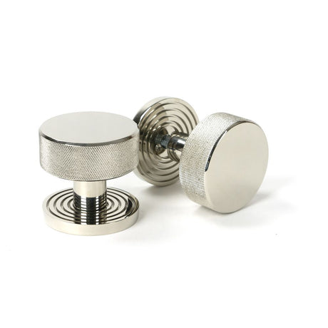 This is an image showing From The Anvil - Polished Nickel Brompton Mortice/Rim Knob Set (Beehive) available from trade door handles, quick delivery and discounted prices