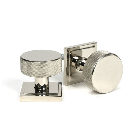 This is an image showing From The Anvil - Polished Nickel Brompton Mortice/Rim Knob Set (Square) available from trade door handles, quick delivery and discounted prices