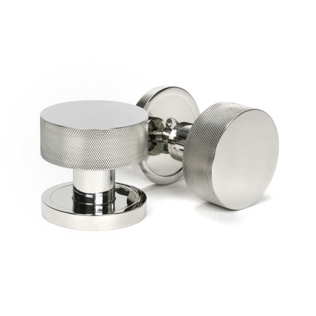 This is an image showing From The Anvil - Polished Marine SS (316) Brompton Mortice/Rim Knob Set (Plain) available from trade door handles, quick delivery and discounted prices