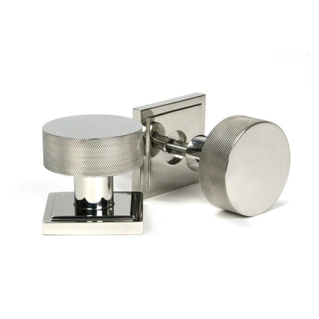 This is an image showing From The Anvil - Polished Marine SS (316) Brompton Mortice/Rim Knob Set (Square) available from trade door handles, quick delivery and discounted prices