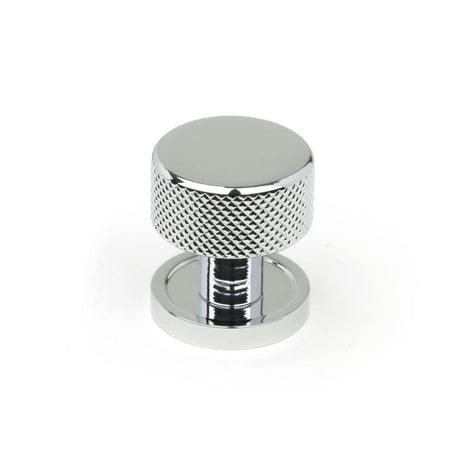 This is an image showing From The Anvil - Polished Chrome Brompton Cabinet Knob - 25mm (Plain) available from trade door handles, quick delivery and discounted prices