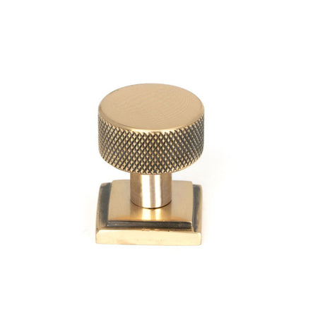 This is an image showing From The Anvil - Polished Bronze Brompton Cabinet Knob - 25mm (Square) available from trade door handles, quick delivery and discounted prices