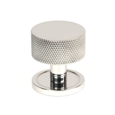 This is an image showing From The Anvil - Polished SS (304) Brompton Cabinet Knob - 32mm (Plain) available from trade door handles, quick delivery and discounted prices