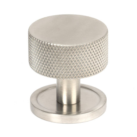 This is an image showing From The Anvil - Satin SS (304) Brompton Cabinet Knob - 32mm (Plain) available from trade door handles, quick delivery and discounted prices