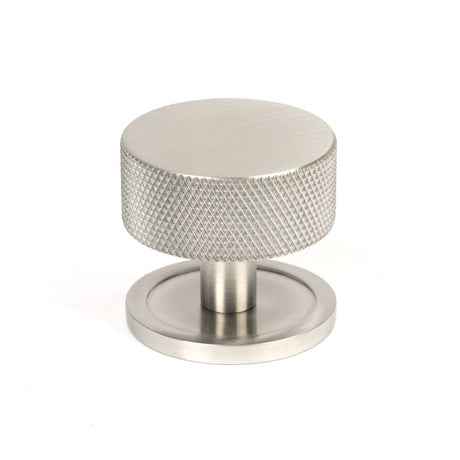 This is an image showing From The Anvil - Satin SS (304) Brompton Cabinet Knob - 38mm (Plain) available from trade door handles, quick delivery and discounted prices
