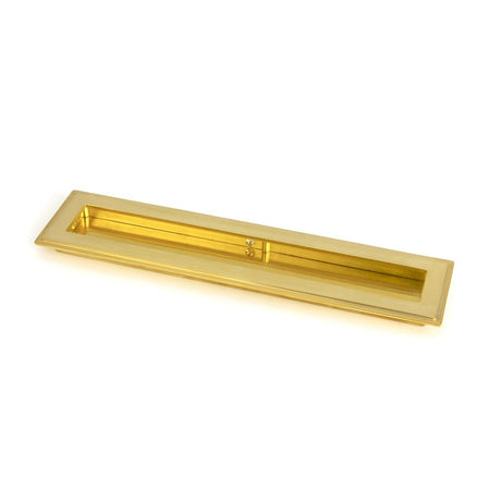 This is an image showing From The Anvil - Polished Brass 250mm Art Deco Rectangular Pull available from trade door handles, quick delivery and discounted prices