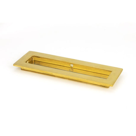 This is an image showing From The Anvil - Polished Brass 175mm Plain Rectangular Pull available from trade door handles, quick delivery and discounted prices