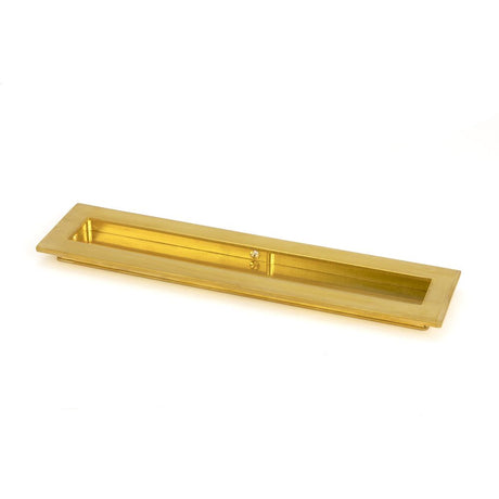 This is an image showing From The Anvil - Polished Brass 250mm Plain Rectangular Pull available from trade door handles, quick delivery and discounted prices