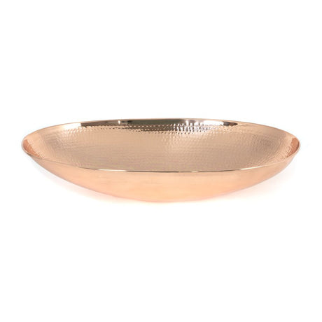 This is an image showing From The Anvil - Hammered Copper Oval Sink available from trade door handles, quick delivery and discounted prices