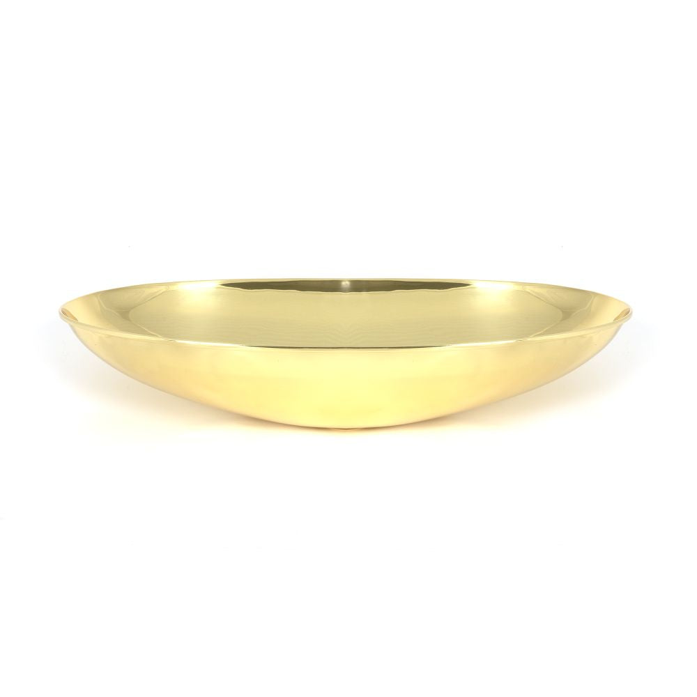 This is an image showing From The Anvil - Smooth Brass Oval Sink available from trade door handles, quick delivery and discounted prices
