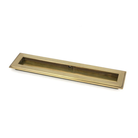 This is an image showing From The Anvil - Aged Brass 250mm Art Deco Rectangular Pull available from trade door handles, quick delivery and discounted prices