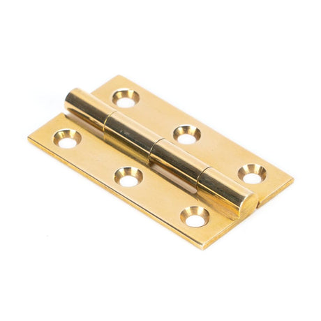 This is an image showing From The Anvil - Polished Brass 2" Butt Hinge (pair) available from trade door handles, quick delivery and discounted prices