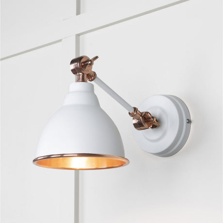 This is an image showing From The Anvil - Smooth Copper Brindley Wall Light in Flock available from trade door handles, quick delivery and discounted prices