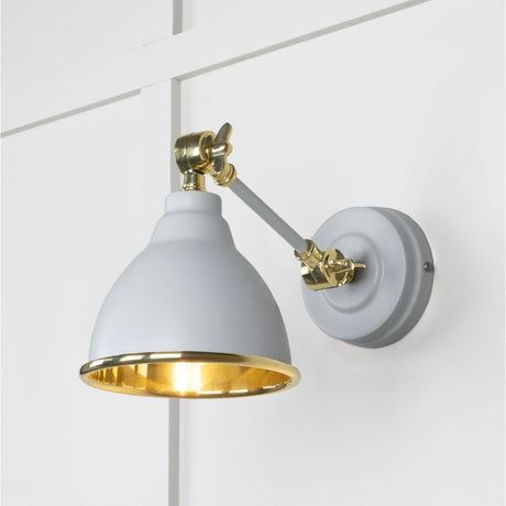This is an image showing From The Anvil - Smooth Brass Brindley Wall Light in Birch available from trade door handles, quick delivery and discounted prices