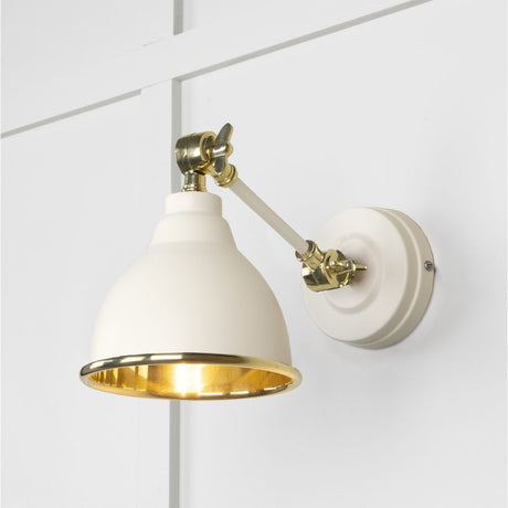 This is an image showing From The Anvil - Smooth Brass Brindley Wall Light in Teasel available from trade door handles, quick delivery and discounted prices