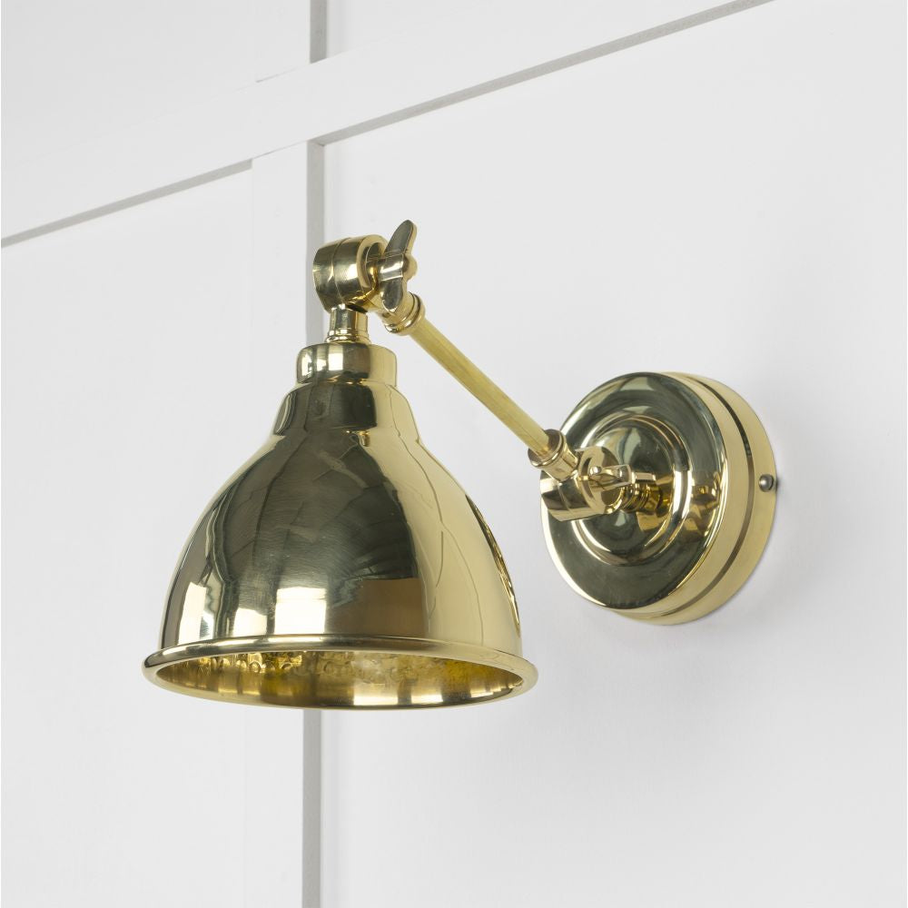 This is an image showing From The Anvil - Hammered Brass Brindley Wall Light available from trade door handles, quick delivery and discounted prices