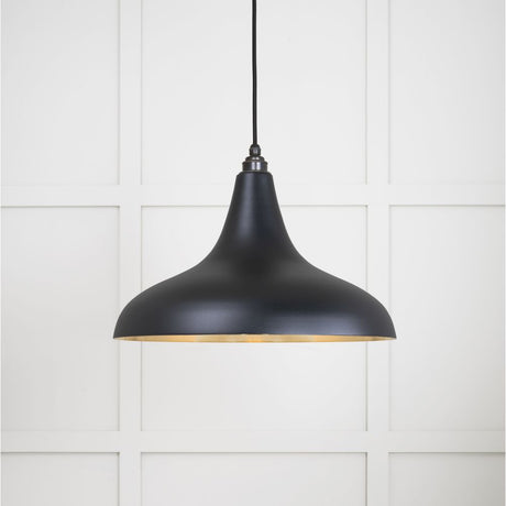 This is an image showing From The Anvil - Smooth Brass Frankley Pendant in Elan Black available from trade door handles, quick delivery and discounted prices