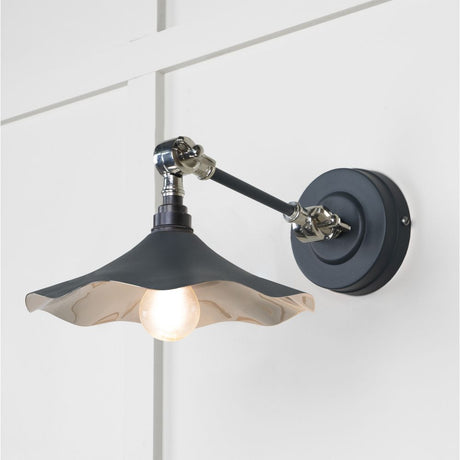 This is an image showing From The Anvil - Smooth Nickel Flora Wall Light in Soot available from trade door handles, quick delivery and discounted prices