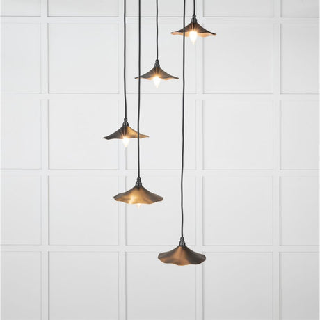 This is an image showing From The Anvil - Smooth Copper Flora Cluster Pendant in Elan Black available from trade door handles, quick delivery and discounted prices
