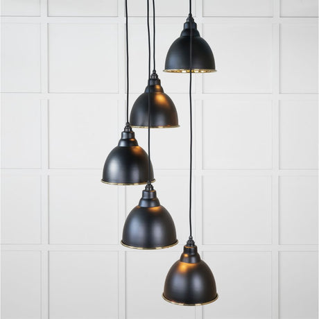 This is an image showing From The Anvil - Hammered Brass Brindley Cluster Pendant in Elan Black available from trade door handles, quick delivery and discounted prices